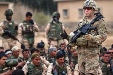 U.S. soldier trains Iraqis at Camp Taji