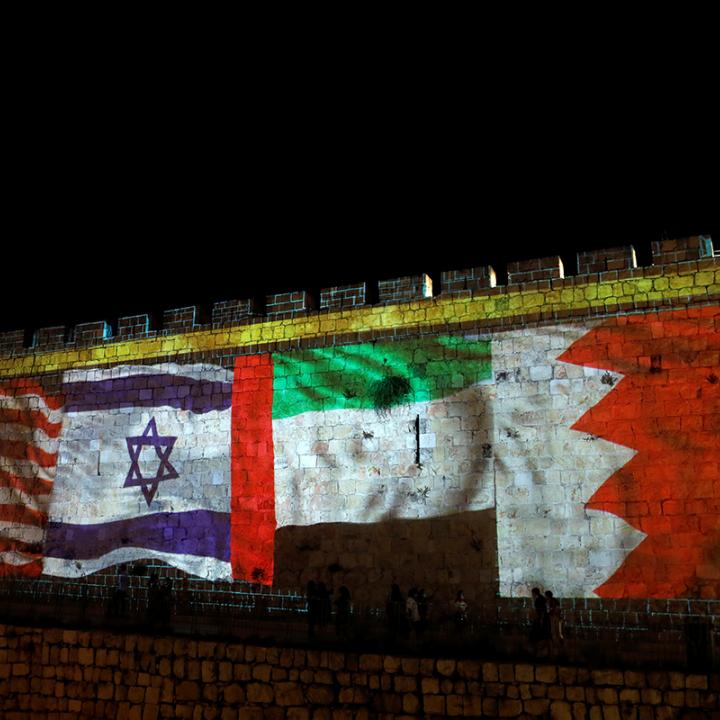 U.S., Israeli, Bahraini, and Qatari flags on a mural celebrating the Abraham Accords