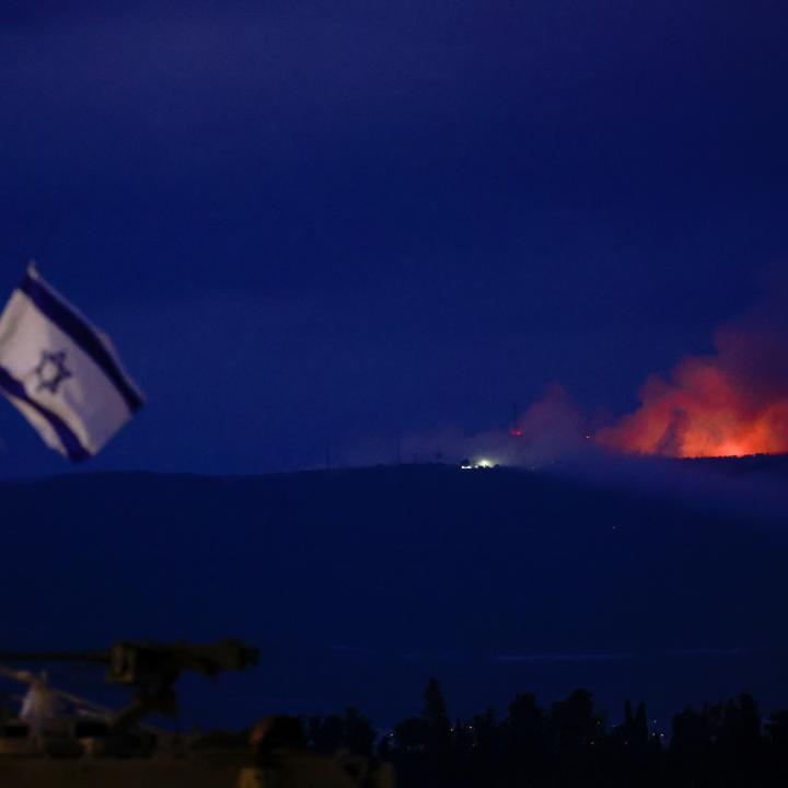 Photo showing flame and smoke rising over Lebanon's border with Israel.