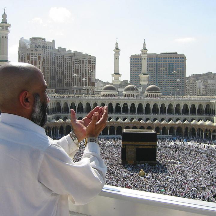 Muslim man praying at al-Aqsa Mosque in Mecca, Saudi Arabia.