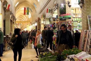 Shoppers at a market in Erbil