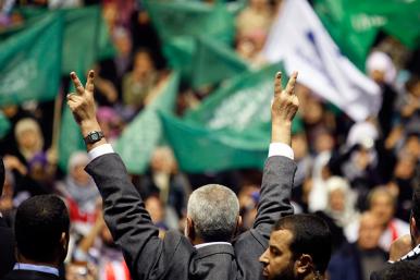 Hamas leader Ismail Haniyeh gestures to supporters