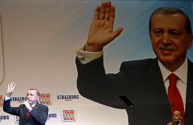 Turkish President Recep Tayyip Erdogan delivers a speech