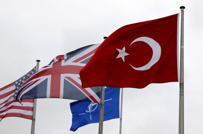 The flags of Turkey, the United States, United Kingdom, and NATO in Brussels