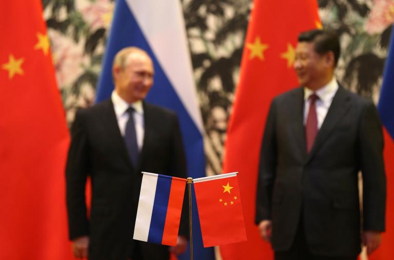 Russian President Vladimir Putin meets Chinese President Xi Jinping at a summit in Beijing - source: Reuters