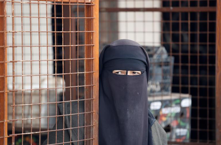 A woman at the Al-Hawl detention camp in Syria - source: Reuters