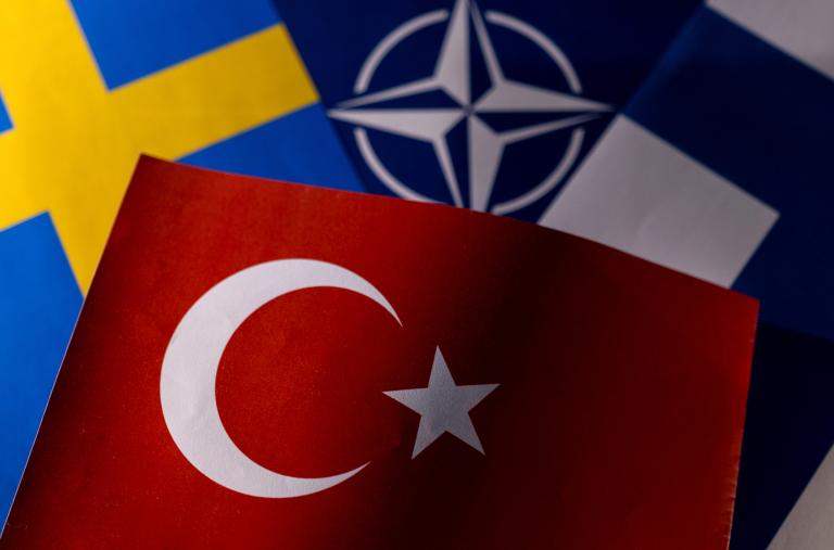 Photo illustration of the flags of Sweden, NATO, Finland, and Turkey - source: Reuters