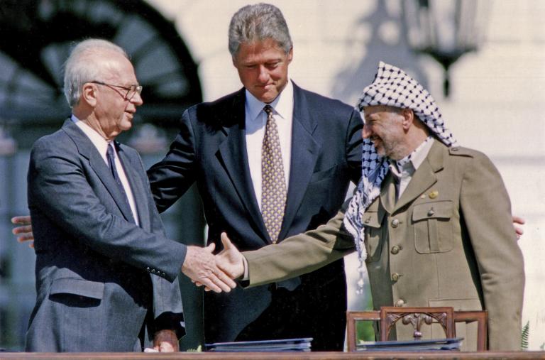 Oslo handshake: Yitzhak Rabin, Bill Clinton, Yasser Arafat