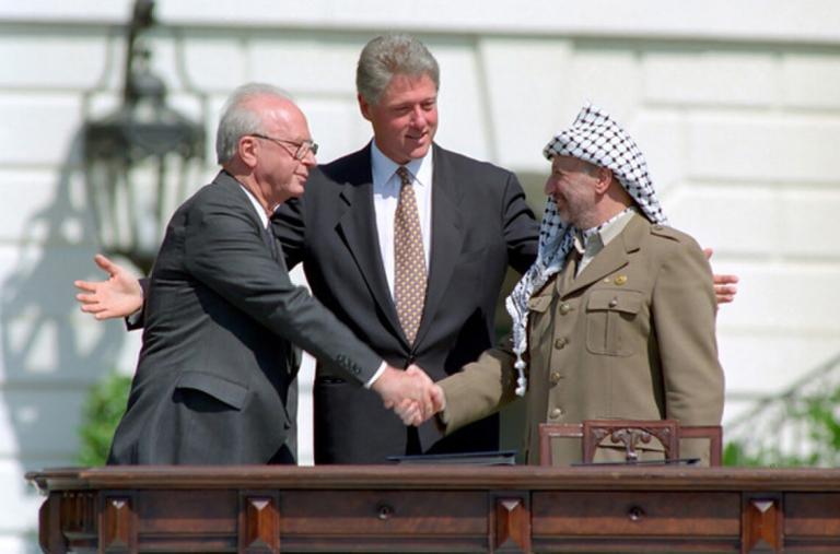 Israeli PM Yitzakh Rabin and PLO Chairman Yasser Arafat shake hands