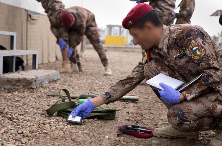 A soldier from Iraq's Counter Terrorism Service participates in a joint training exercise with U.S. colleagues - source: U.S. Department of Defense