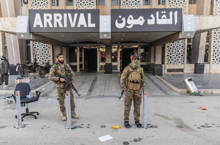 Photo showing Syrian rebels outside Aleppo International Airport.