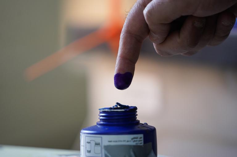 An Iraqi voter dips their finger in ink after casting a ballot in regional elections in Iraqi Kurdistan in 2024 - source: Reuters