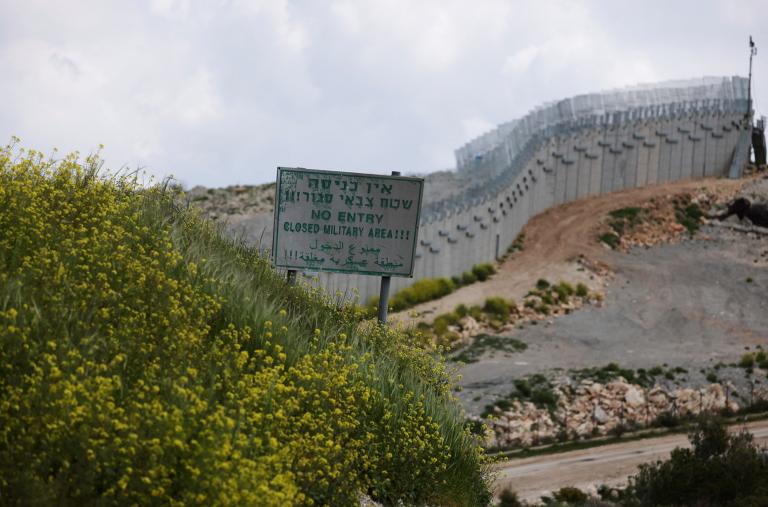 A sign and barrier along the Israel-Lebanon border - source: Reuters