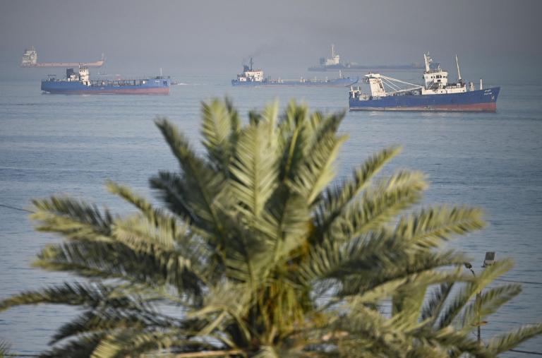 Ships gather in waters off the Iranian island of Bandar Abbas along the Strait of Hormuz - source: Reuters