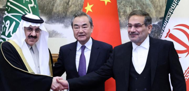 Saudi, Chinese, and Iranian foreign ministers shaking hands