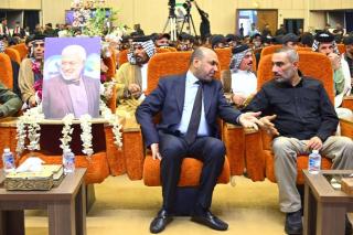 Adnan al-Asadi and Haider al-Gharawi side by side in a funeral on November 18