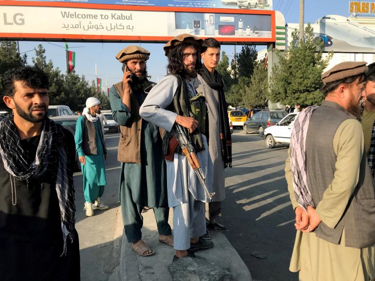 Photo showing Taliban fighters outside Kabul Airport, August 2021.