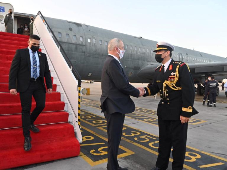 Israeli defense minister Benny Gantz is greeted by a Bahraini defense official upon his arrival in Manama - source: Reuters