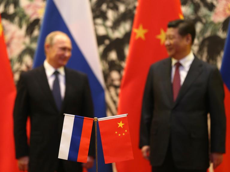 Russian President Vladimir Putin meets Chinese President Xi Jinping at a summit in Beijing - source: Reuters