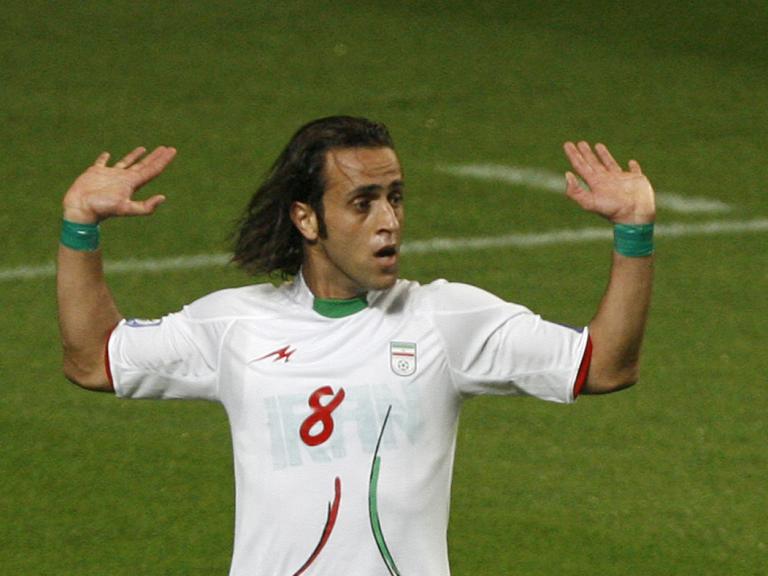 Iran's Ali Karimi, wearing green wristbands at a 2010 World Cup qualifier - source: Reuters
