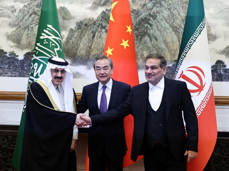 Wang Yi, director of China's Office of the Central Foreign Affairs Commission, Ali Shamkhani, secretary of Iran’s Supreme National Security Council, and Minister of State and national security adviser of Saudi Arabia Musaad bin Mohammed Al Aiban shake hands in Beijing in March 2023 - source: Reuters