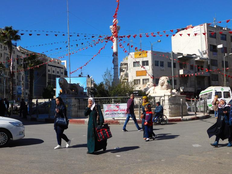 Pedestrians near Manara Circle, downtown Ramallah