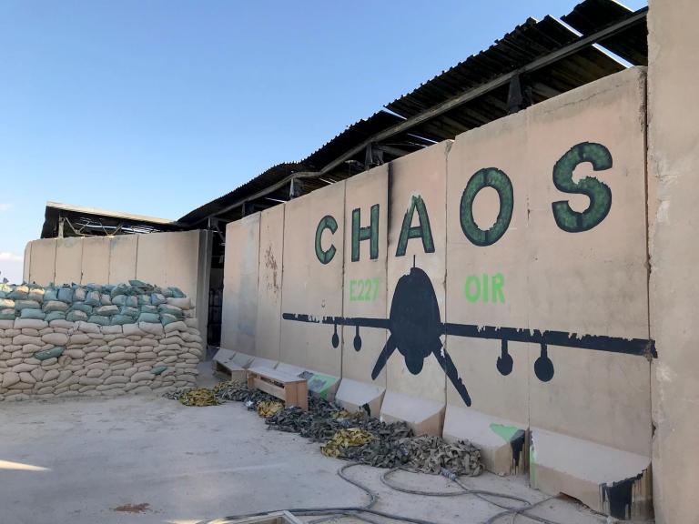 Photo of a blast wall with a drone mural at al-Asad Air Base in Iraq.