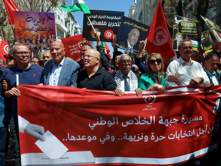 Imed Khemiri, a senior official in the Ennahda party and member of the Salvation Front (L) takes part in a protest, demanding the release of imprisoned journalists, activists, opposition figures and setting a date for fair presidential elections in Tunis, Tunisia May 12, 2024 - source: Reuters