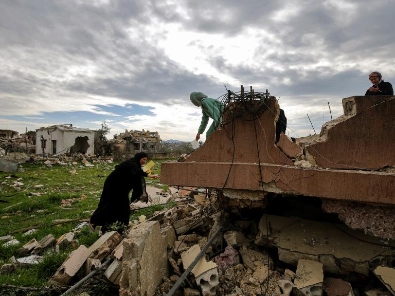 Photo of Shia women returning to their war-damaged village in south Lebanon.
