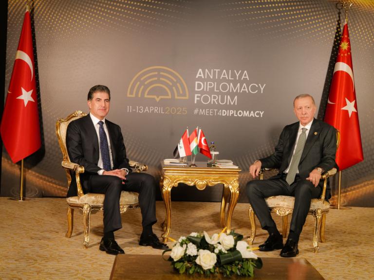 Barzani and Erdogan sitting across from each other, April 2025