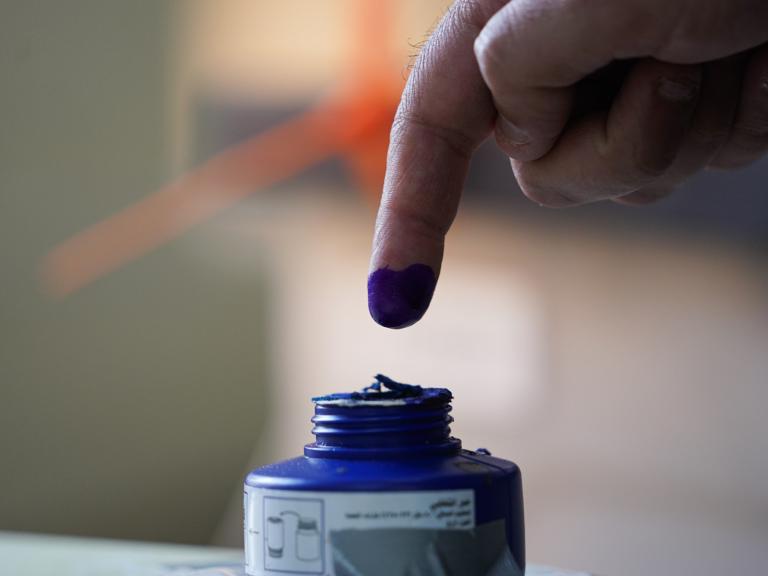 An Iraqi voter dips their finger in ink after casting a ballot in regional elections in Iraqi Kurdistan in 2024 - source: Reuters