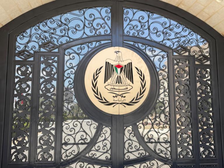 The seal of the Palestinian Authority on a gate at PA headquarters in Ramallah - source: Reuters
