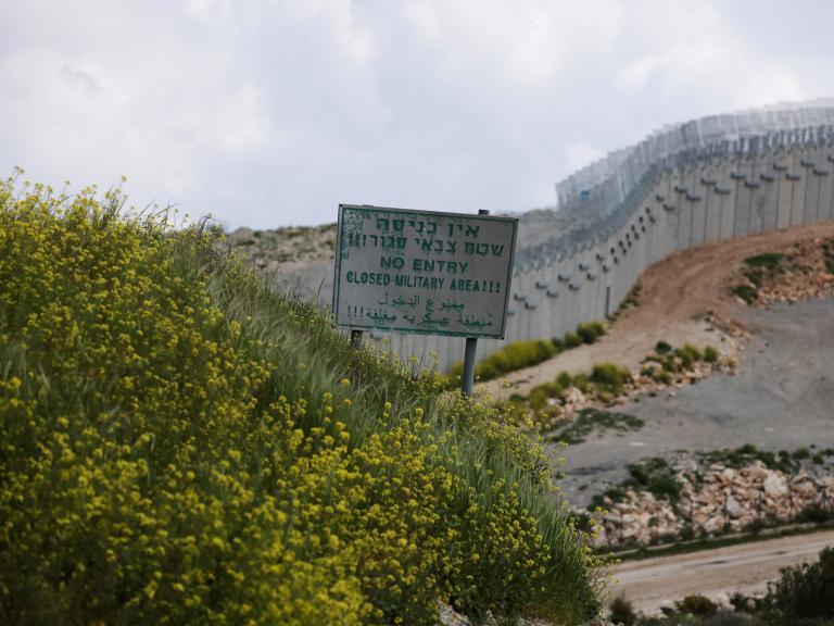 A sign and barrier along the Israel-Lebanon border - source: Reuters