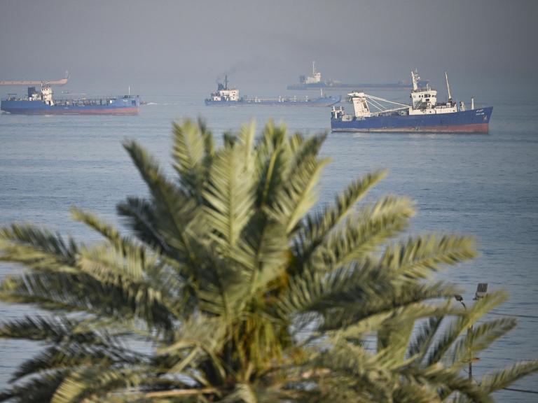 Ships gather in waters off the Iranian island of Bandar Abbas along the Strait of Hormuz - source: Reuters