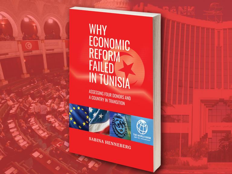 Against parliamentary hall backdrop, book cover includes Tunisian flag imagery at top, EU, USA, IMF, World Bank imagery at bottom. 