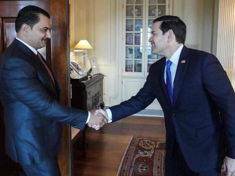 Photo of Marco Rubio shaking hands with Sadaam Haftar.