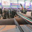 Iranian military leaders inspect drones.