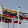 Venezuelan and Iranian flags flying during a state visit in Tehran - source: Reuters