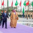 Crown Prince Muhammad and President Xi walking in Riyadh.