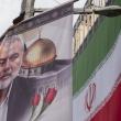 A poster depicts former Hamas leader Ismail Haniyeh alongside the Iranian flag in Tehran following Haniyeh's killing in Iran - source: Reuters