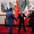Chinese Foreign Minister Wang Yi greets Russian Deputy Foreign Minister Sergey Ryabkov and Iranian Deputy Foreign Minister Kazem Gharibabadi in Beijing in March 2025 - source: Reuters