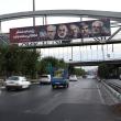 A highway bridge in Tehran displays images of nuclear scientists killed during Israeli strikes against Iran in June 2025 - source: Reuters