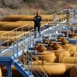 A worker inspects oil pipes near Turkey's Mediterranean Coast - source: Reuters