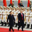 Chinese president Xi walks with U.S. president Trump in Beijing in 2017 - source: Reuters