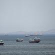 Ships and boats await passage in the Persian Gulf - source: Reuters