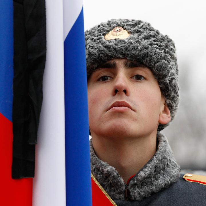 A Russian soldier and flag