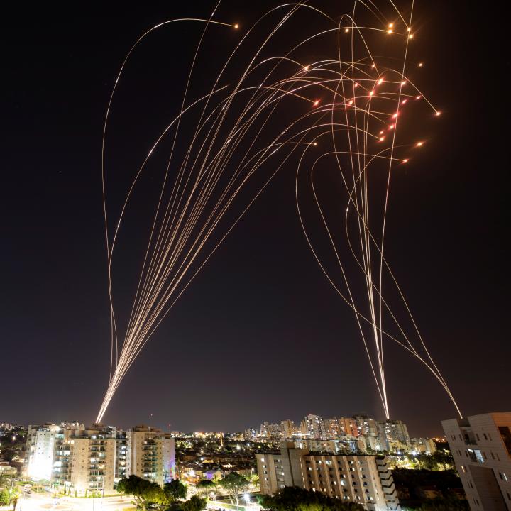 Photo showing the Iron Dome defense system intercepting Hamas rockets over Ashkelon, Israel, in May 2021.