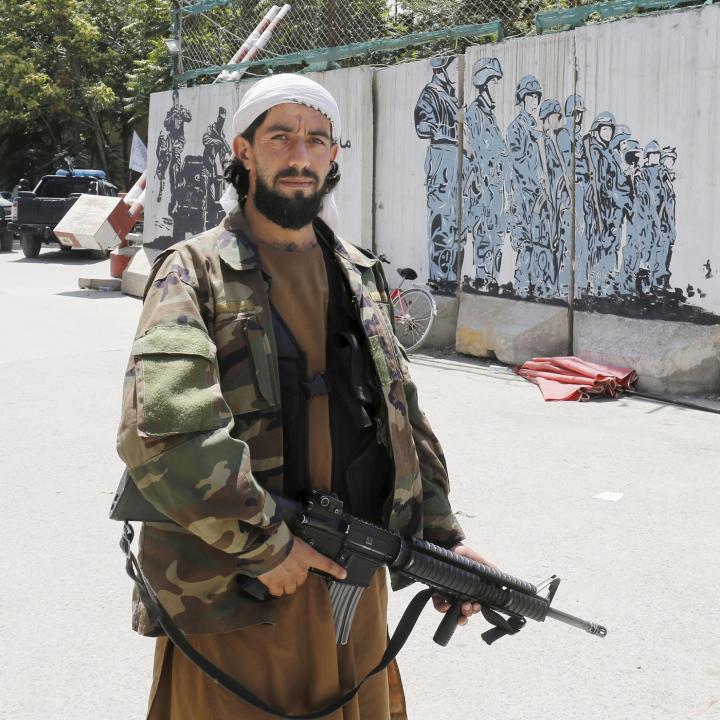 A Taliban fighter at a police station in Kabul