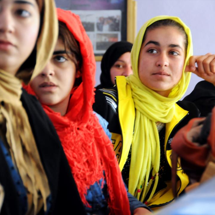 Afghan women attend a photography class, 2013.