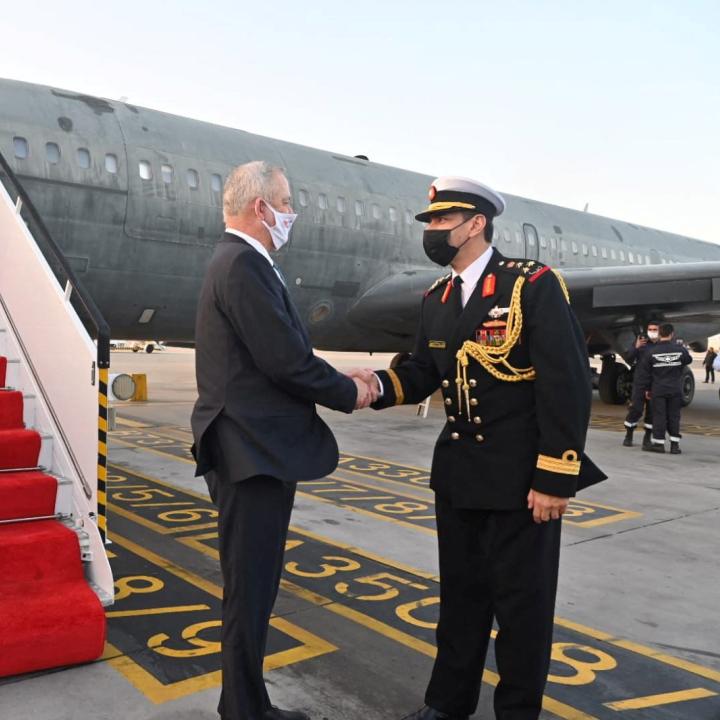 Israeli defense minister Benny Gantz is greeted by a Bahraini defense official upon his arrival in Manama - source: Reuters